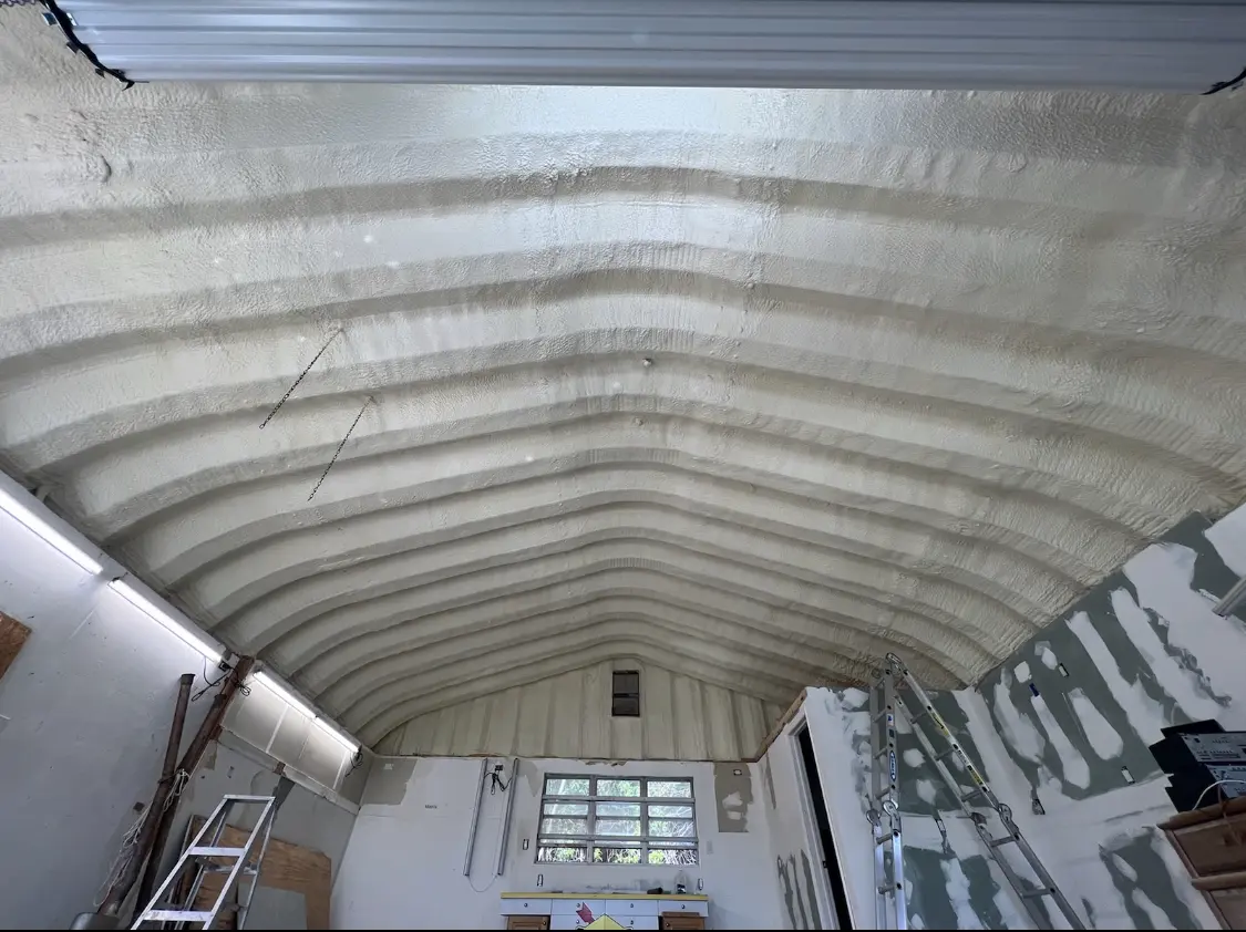 Spray polyurethane foam applied to the underside of a metal roof deck in Bogalusa